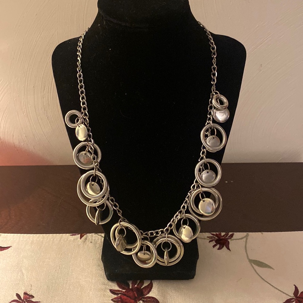 Charming Charlie - Lightweight silver color necklace w/ 12 sets of layered hoops